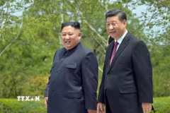 Tổng Bí thư, Chủ tịch Trung Quốc Tập Cận Bình và nhà lãnh đạo Triều Tiên Kim Jong Un. (Nguồn: TTXVN)
