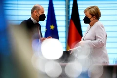 Bộ trưởng Tài chính Olaf Scholz và Thủ tướng Angela Merkel. (Nguồn: Reuters) 