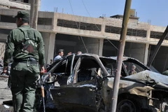 Hiện trường vụ đánh bom tại quận al-Antariyeh của thành phố Qamishli, miền Bắc Syria. (Nguồn: AFP/TTXVN)