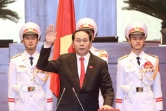 Chủ tịch nước Trần Đại Quang tuyên thệ nhậm chức. (Ảnh: Nhan Sáng/TTXVN)