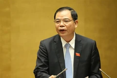 Bộ trưởng Bộ Nông nghiệp và Phát triển Nông thôn Nguyễn Xuân Cường giải trình ý kiến của các Đại biểu Quốc hội. (Ảnh: Dương Giang/TTXVN)
