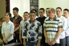 Các bị cáo tại phiên xét xử. (Ảnh: Thanh Tân/TTXVN)