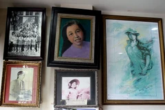 Những bức ảnh liệt sỹ Đặng Thùy Trâm treo trong gia đình. (Ảnh: Doãn Đức/Vietnam+)