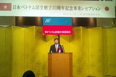 Đại sứ Việt Nam tại Nhật Bản Đoàn Xuân Hưng phát biểu tại buổi gặp mặt. (Ảnh: Hữu Thắng/Vietnam+) 