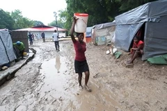 Cảnh bùn lầy tại khu lều tạm ở Port-au-Prince năm 2010. Ảnh minh họa (Nguồn: AFP/TTXVN)