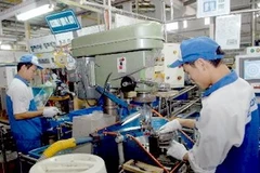 Công nhân làm việc tại Khu công nghiệp Khai Quang, Vĩnh Phúc. Ảnh minh họa. (Ảnh: Danh Lam/TTXVN)