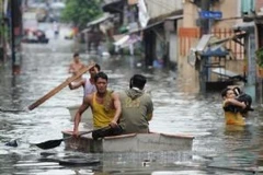 Bão Sơn Tinh gây mưa khiến nhiều khu vực ở Manila, Philippines ngập nặng. (Nguồn: AFP). 