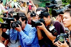 Nhà báo tác nghiệp. (Nguồn: Internet)