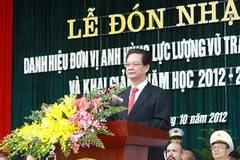 Thủ tướng Nguyễn Tấn Dũng phát biểu tại buổi lễ khai giảng của Học viện Cảnh sát nhân dân (Ảnh: Doãn Tấn/TTXVN).