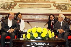 Chủ tịch UBND thành phố Hồ Chí Minh Lê Hoàng Quân tiếp ông Rudy Demotte, Thủ hiến vùng Wallonie, Bỉ. (Ảnh: Hoàng Hải/ TTXVN)