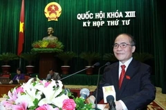 Chủ tịch Quốc hội Nguyễn Sinh Hùng đọc Diễn văn khai mạc kỳ họp. (Ảnh: Nhan Sáng/TTXVN). 