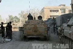 Xe tăng quân đội Syria ở Damascus (Nguồn: AFP/TTXVN)