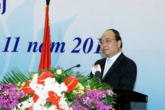 Phó Thủ tướng Nguyễn Xuân Phúc dự và phát biểu tại hội nghị. (Ảnh: Nguyễn Dân/TTXVN)