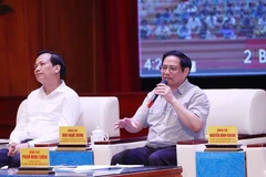 Thủ tướng Phạm Minh Chính đối thoại với công nhân lao động năm 2022. (Ảnh: Dương Giang/TTXVN)