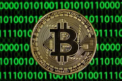 Biểu tượng đồng Bitcoin tại Dortmund, miền Tây Đức. (Ảnh: AFP/TTXVN)