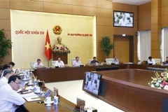 UBTV Quốc hội thông qua dự án Pháp lệnh Xử phạt vi phạm hành chính đối với hành vi cản trở hoạt động tố tụng. (Ảnh: Doãn Tuấn/TTXVN)