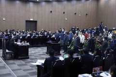 Các bị cáo tại phiên tòa sáng 21/12/2022. (Ảnh: An Đăng/TTXVN)
