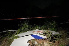 Hiện trường vụ rơi máy bay của hãng hàng không China Eastern Airlines ở khu tự trị dân tộc Choang Quảng Tây, Trung Quốc, ngày 21/3/2022. (Ảnh: THX/TTXVN)