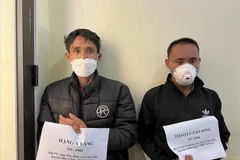 Hai đối tượng tại cơ quan công an. (Ảnh: laodong.vn)