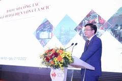 Phó Tổng Giám đốc SCIC Lê Thanh Tuấn báo cáo tại Hội nghị. (Ảnh: VGP)