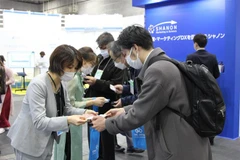 Bà Nguyễn Thị Thu Hằng, Tổng Giám đốc CMC Japan (trái). (Ảnh: Đào Thanh Tùng/TTXVN)