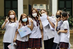 Thí sinh tại điểm thi Trường THPT Lê Quý Đôn, quận 3, TP.HCM vui vẻ vì làm được bài. (Ảnh: Hồng Giang/TTXVN)