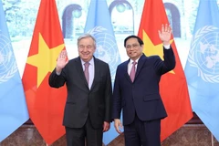 Thủ tướng Phạm Minh Chính tiếp Tổng Thư ký Liên hợp quốc António Guterres. (Ảnh: Dương Giang/TTXVN)