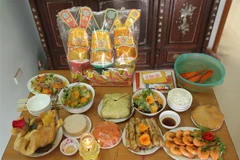 Mâm cỗ cúng ông Công, ông Táo của miền Bắc. (Ảnh: Hoàng Hiếu/TTXVN)