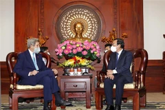 Bí thư Thành ủy Thành phố Hồ Chí Minh Nguyễn Văn Nên tiếp ông John Kerry, Đặc phái viên của Tổng thống Hoa Kỳ về Biến đổi khí hậu. (Ảnh: Thanh Vũ/TTXVN)