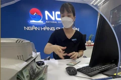 Áp lực thị trường vốn được dự báo sẽ giảm dần trong năm 2023. (Ảnh: Trần Việt/TTXVN)