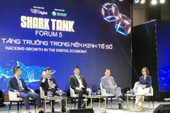 Các chuyên gia, doanh nghiệp tham gia phiên thảo luận tại Shark Tank Forum 2022. (Ảnh: Mỹ Phương/TTXVN)