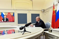 Tổng thống Nga Vladimir Putin tại cuộc họp trực tuyến với Chủ tịch Trung Quốc Tập Cận Bình ngày 28/6/2021. (Ảnh: AFP/TTXVN)