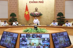 Thủ tướng Phạm Minh Chính chủ trì Hội nghị trực tuyến Chính phủ với địa phương và Phiên họp Chính phủ thường kỳ tháng 9 năm 2022. (Ảnh: Dương Giang/TTXVN)