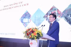 Phó Tổng Giám đốc SCIC Lê Thanh Tuấn báo cáo tại Hội nghị. (Ảnh: VGP)