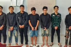 Các đối tượng tại cơ quan công an. (Ảnh: TTXVN phát)