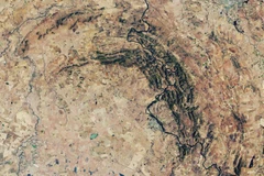 Hình ảnh những gì còn lại của miệng hố Vredefort, hình thành cách đây 2 tỷ năm sau cú va chạm của một tiểu hành tinh khổng lồ. (Nguồn: NASA)