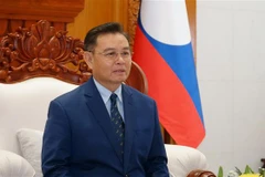 Chủ tịch Quốc hội Lào Xaysomphone Phomvihane trả lời phỏng vấn phóng viên TTXVN tại Lào về quan hệ hợp tác giữa hai Quốc hội. (Ảnh: Phạm Kiên/TTXVN)