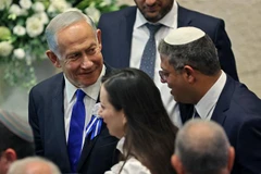 Thủ tướng Israel Benjamin Netanyahu (trái) và ông Itamar Ben-Gvir (phải), lãnh đạo đảng cực hữu Quyền lực Do thái, tại cuộc gặp ở Jerusalem, ngày 15/11/2022. (Ảnh: AFP/TTXVN)