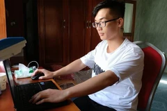 Thủ khoa cả nước tổ hợp B00 Bùi Đức Anh với tổng điểm số 29,35 điểm. (Ảnh: Thu Hoài/TTXVN)