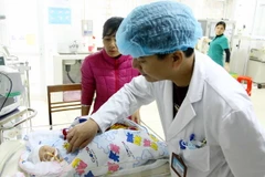 Sức khỏe 2 mẹ con chị Loan đã ổn định. (Ảnh: Thế Duyệt/TTXVN)