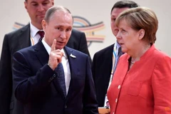 Tổng thống Nga Vladimir Putin và Thủ tướng Đức Angela Merkel trong một cuộc gặp. (Nguồn: Reuters)