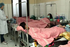 Khám, tư vấn cho bệnh nhân cúm. (Ảnh minh họa. Nguồn: TTXVN)