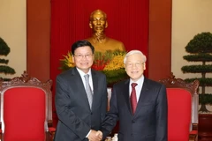 Tổng Bí thư Nguyễn Phú Trọng tiếp Thủ tướng Lào Thongloun Sisoulith. (Ảnh: Trí Dũng/TTXVN)