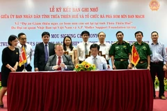 Quang cảnh buổi lễ ký kết. (Ảnh: Quốc Việt/TTXVN)