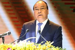 Thủ tướng Nguyễn Xuân Phúc dự và phát biểu tại hội nghị.(Ảnh: Thống Nhất/TTXVN)