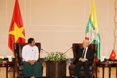 Tổng Bí thư Nguyễn Phú Trọng tiếp Chủ tịch Đảng Đoàn kết và Phát triển Liên bang Myanmar (USDP) Than Htay. (Ảnh: Trí Dũng/TTXVN)