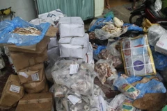 Tang vật bị bắt giữ. (Ảnh: Phan Quân/TTXVN)