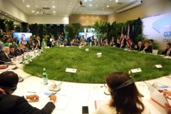 Các đại biểu thảo luận tại Hội nghị ở Bologna. (Nguồn: AFP/TTXVN)