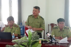 Ông Đoàn Hoài Nam, Phó Cục trưởng Cục Kiểm Lâm công bố Quyết định thanh tra. (Ảnh: Xuân Triệu/TTXVN)