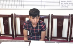 Đối tượng Nguyễn Chính Ân tại cơ quan điều tra (Ảnh: Võ Phương/Vietnam+)